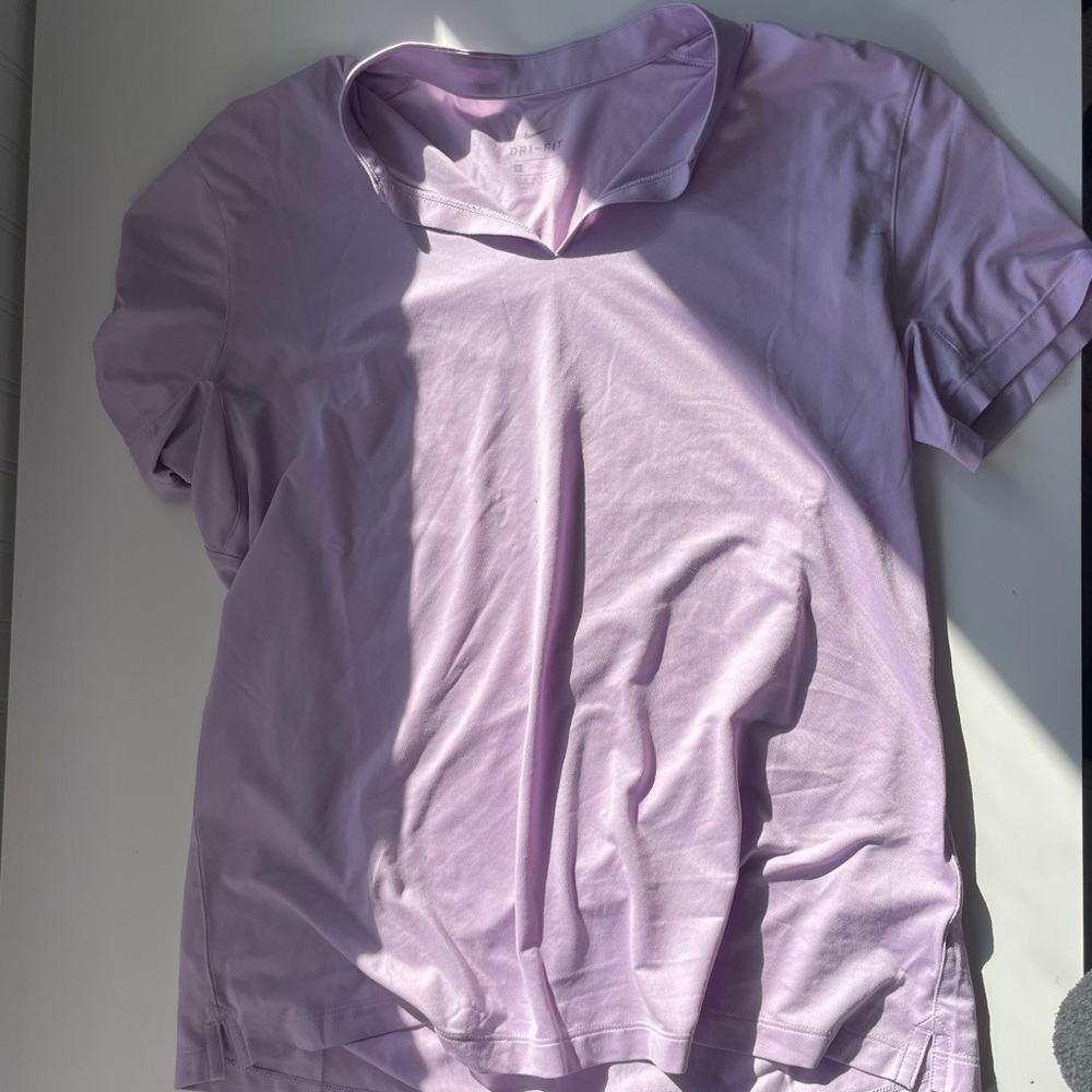 Light purple dry fit Nike shirt, great condition, never worn